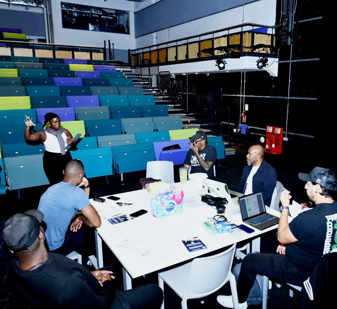 Director Rochelle Newman rehearsing with the cast