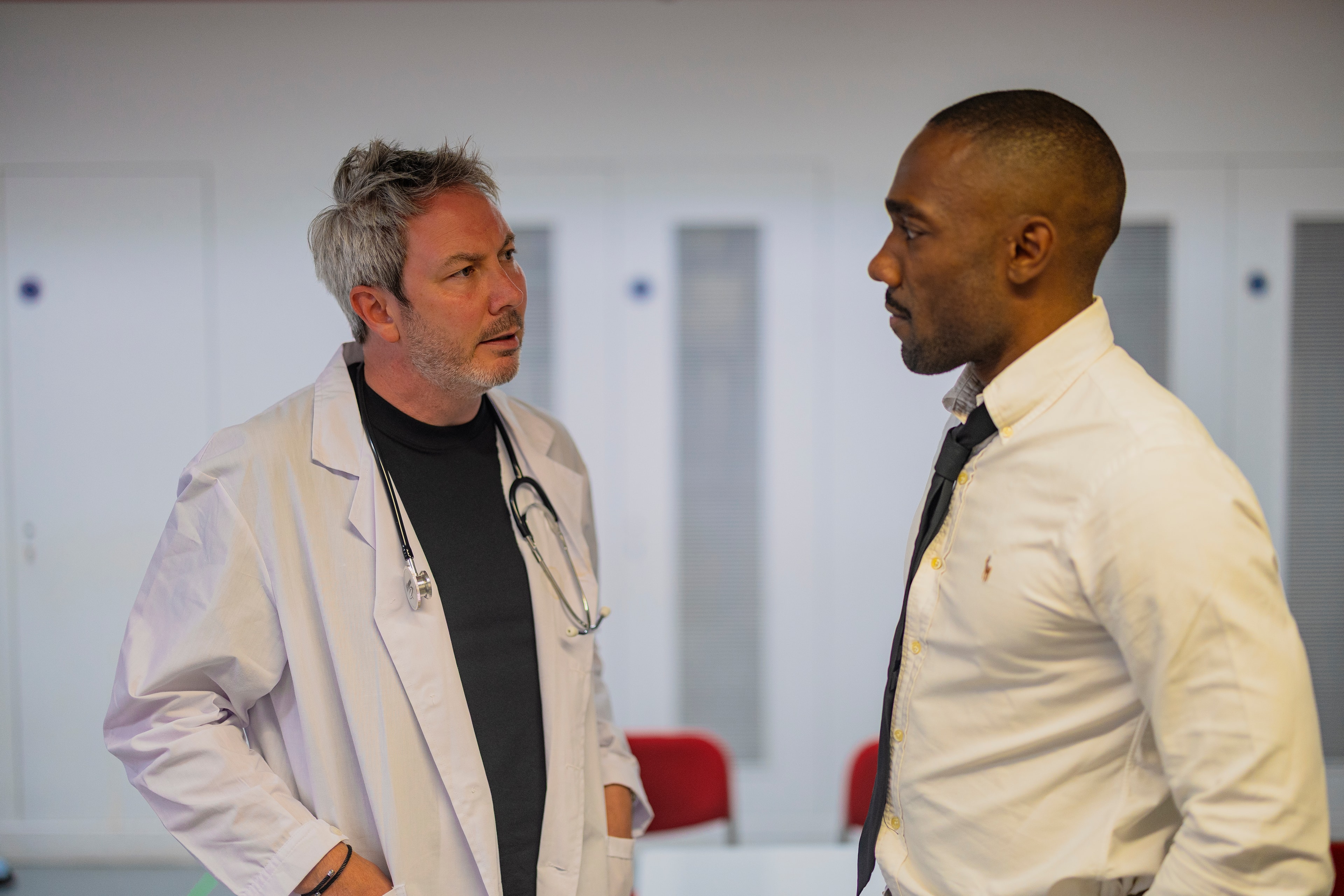 Doctor and patient characters in rehearsal — medical scene